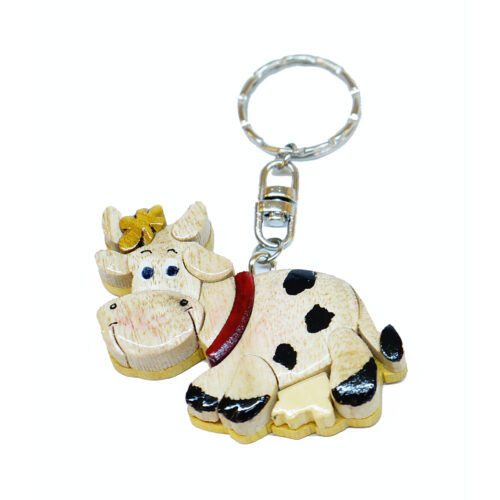 playful cow intarsia keychain